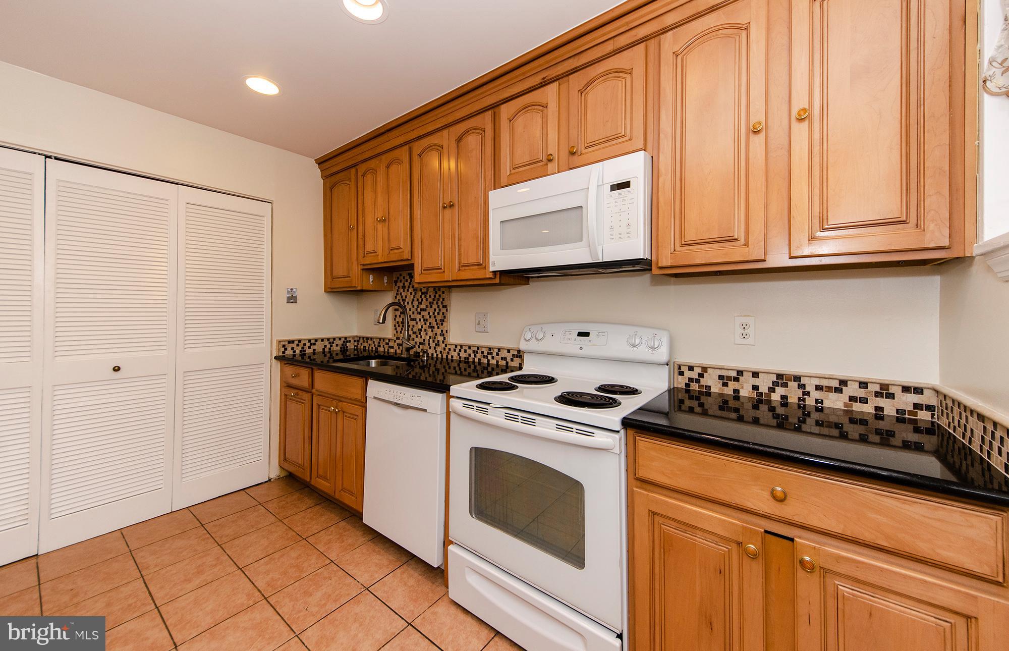 4011 Arcadia Road Alexandria, VA 22312 - Photo 15 of 32 Renovated Kitchen with granite countertops