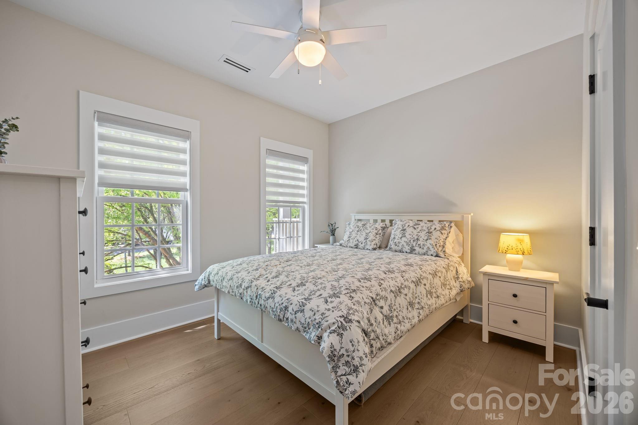 241 North Faulkner Way Davidson, NC 28036 - Photo 26 of 39 a bedroom with a bed dresser and a window