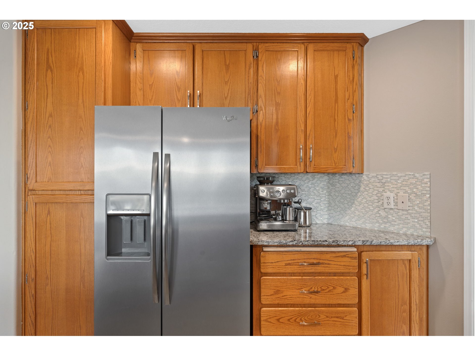 2326 Southeast Robin Lane Gresham, OR 97080 - Photo 12 of 33 a kitchen with stainless steel appliances granite countertop a refrigerator and cabinets