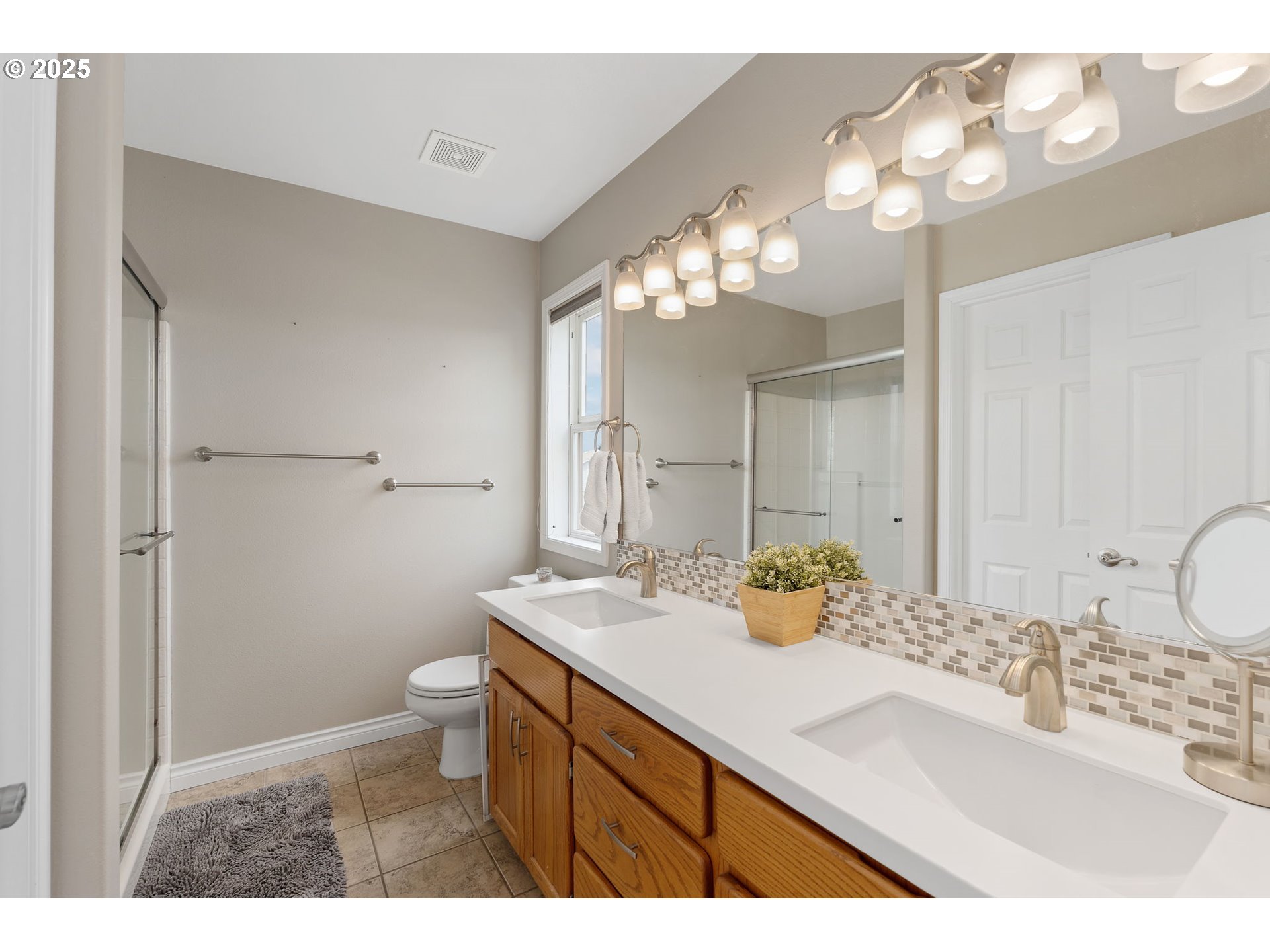 2326 Southeast Robin Lane Gresham, OR 97080 - Photo 19 of 33 a bathroom with a sink double vanity and a mirror
