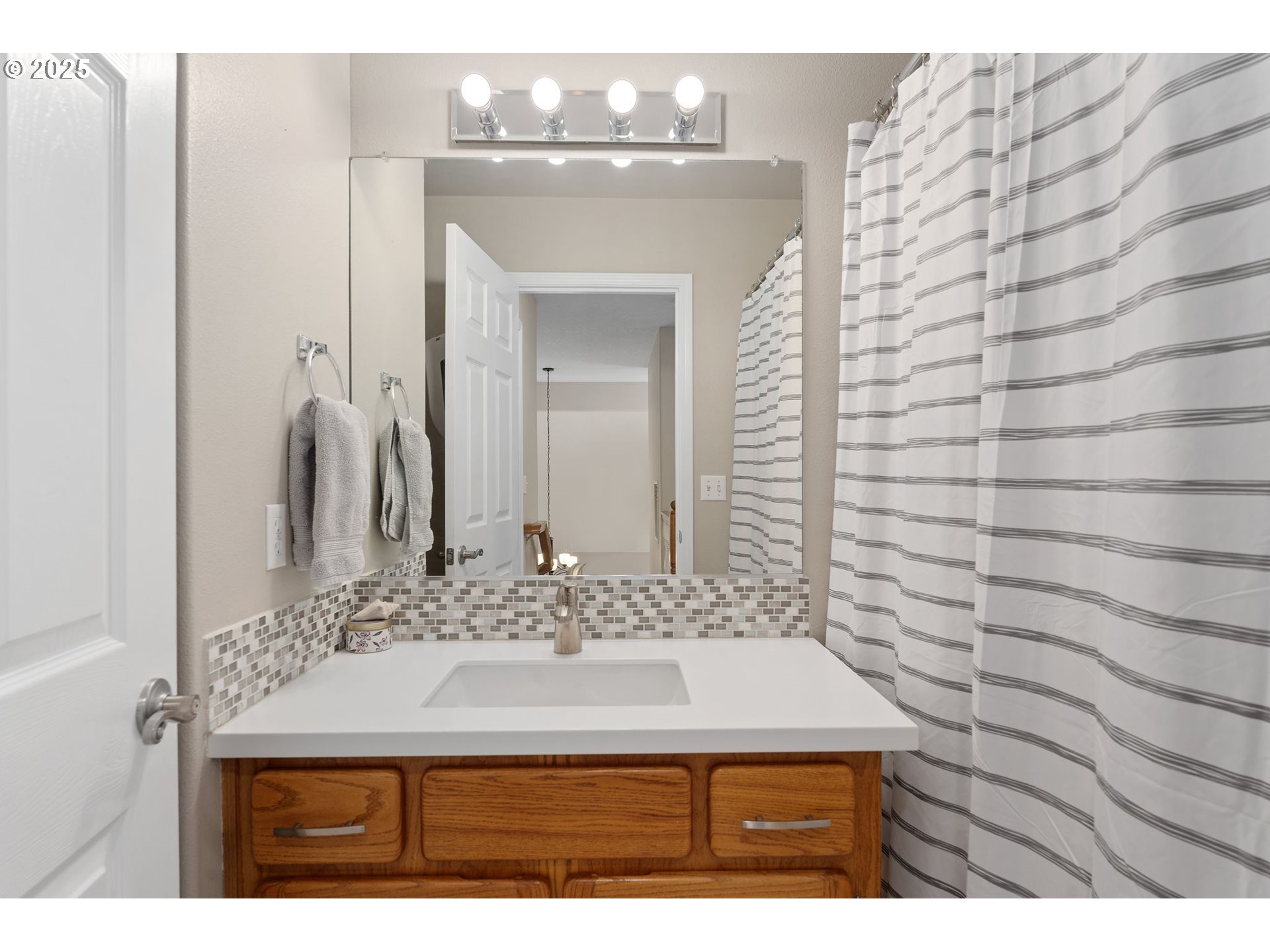 2326 Southeast Robin Lane Gresham, OR 97080 - Photo 24 of 33 a bathroom with a sink and a mirror