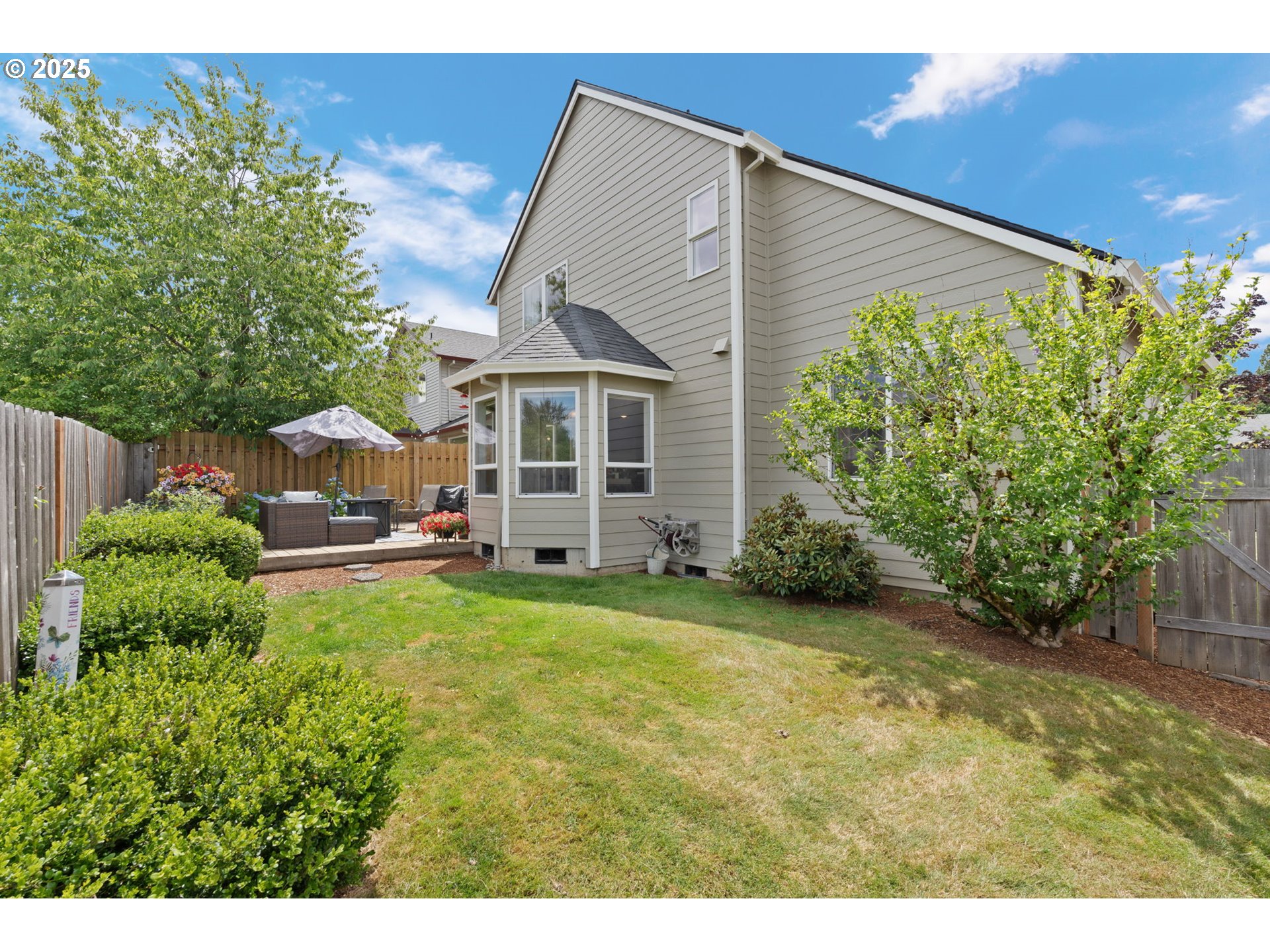 2326 Southeast Robin Lane Gresham, OR 97080 - Photo 29 of 33 a view of a house with backyard and garden