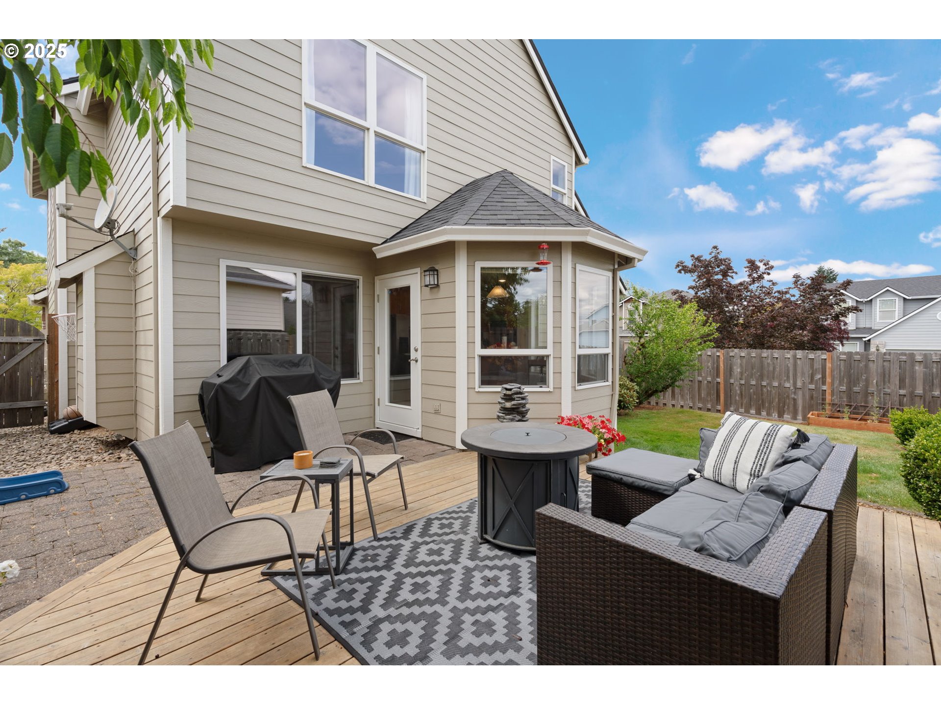 2326 Southeast Robin Lane Gresham, OR 97080 - Photo 30 of 33 a view of a house with patio and a yard