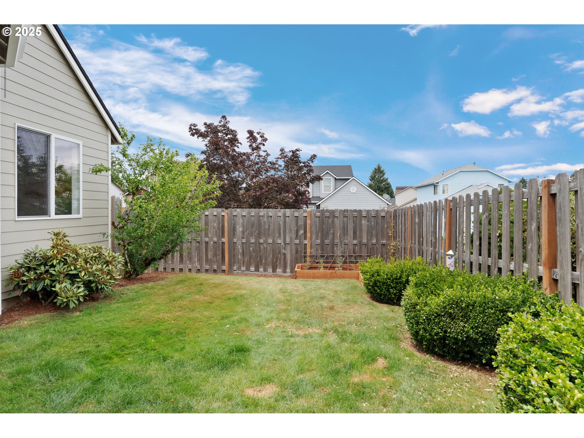 2326 Southeast Robin Lane Gresham, OR 97080 - Photo 32 of 33 a garden with trees in front of it