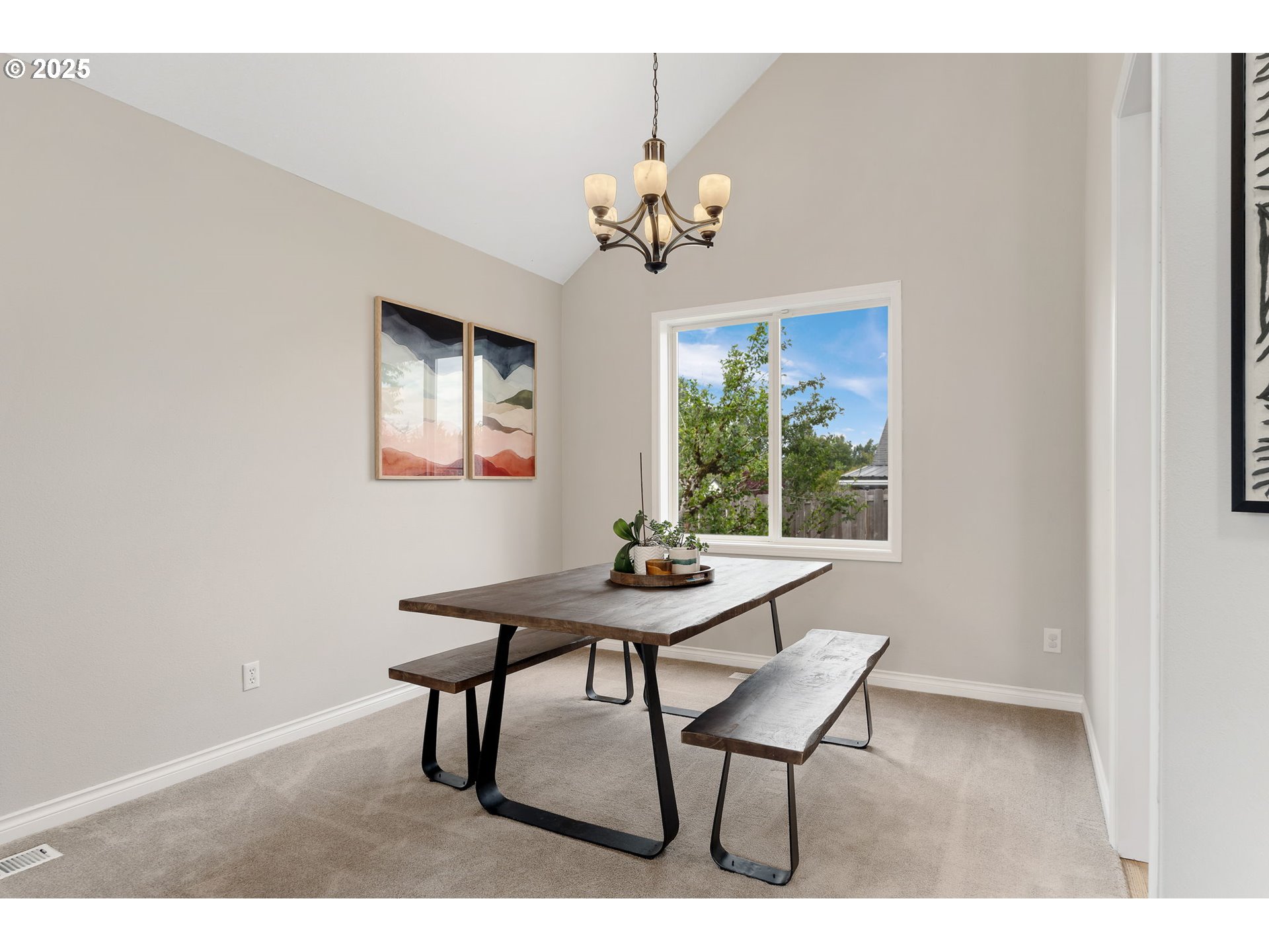 2326 Southeast Robin Lane Gresham, OR 97080 - Photo 8 of 33 a view of a dining room with furniture and a chandelier