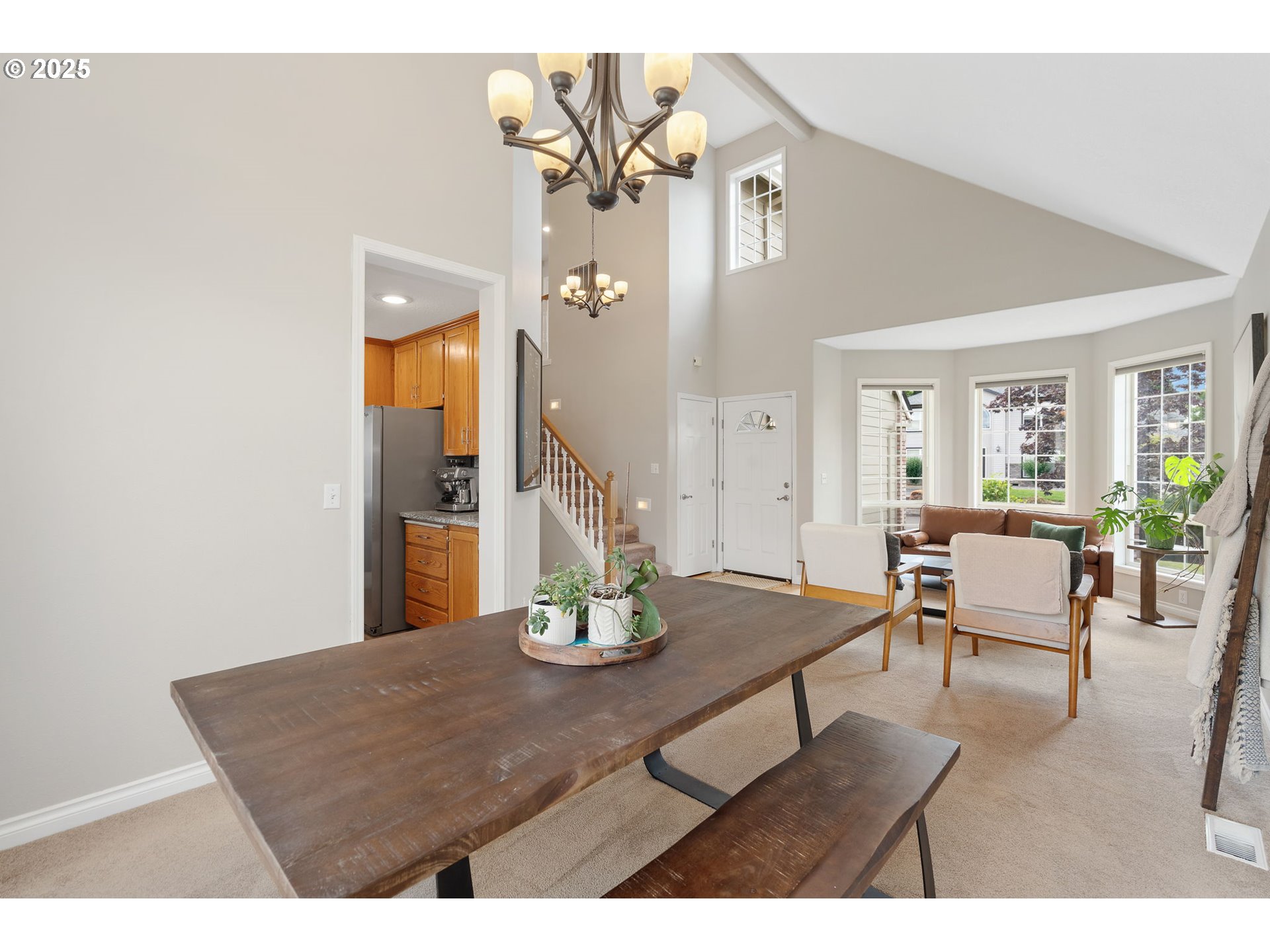 2326 Southeast Robin Lane Gresham, OR 97080 - Photo 9 of 33 a view of a dining room with furniture and a chandelier