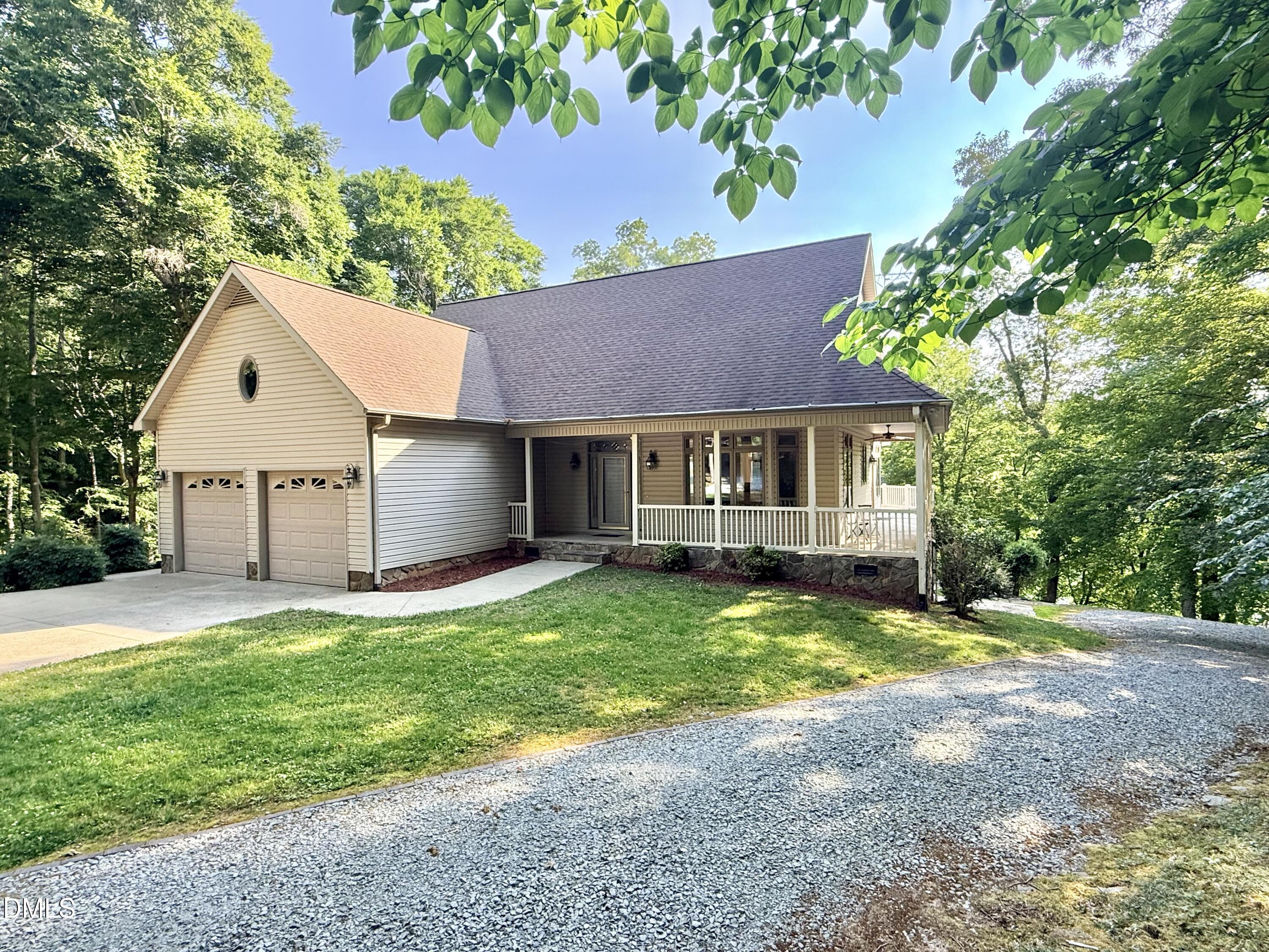 81 Beaver Crossing Road Roxboro, NC 27574 - Photo 4 of 80 a view of a house with a yard and tree s