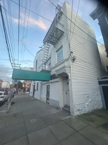 a view of a garage with table and chairs