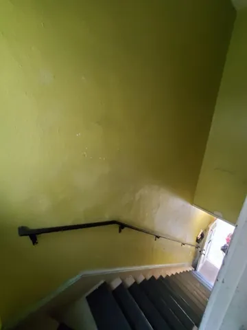 a view of a room with racks on the wall