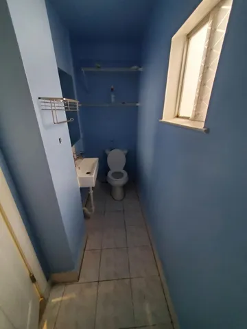 a bathroom with a toilet