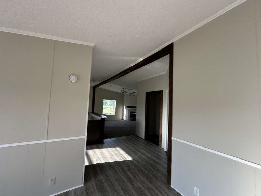102 Bailey Street Van Alstyne, TX 75495 - Photo 12 of 14 a view of hallway with wooden floor