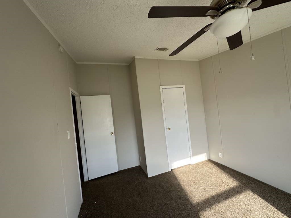 102 Bailey Street Van Alstyne, TX 75495 - Photo 8 of 14 a view of an empty room