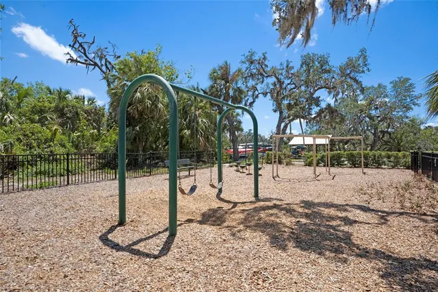 a view of outdoor space with trees all around
