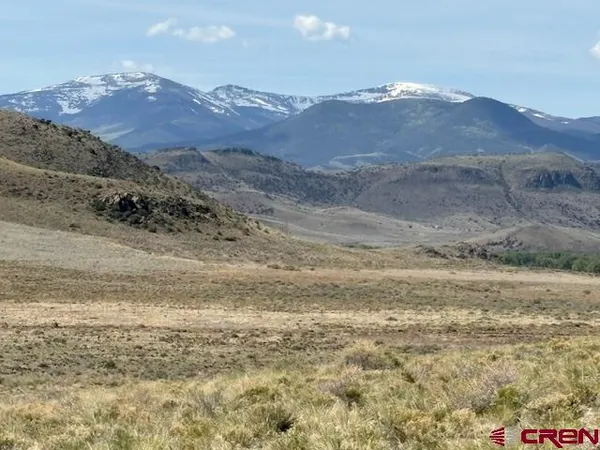 a view of a backyard with mountain