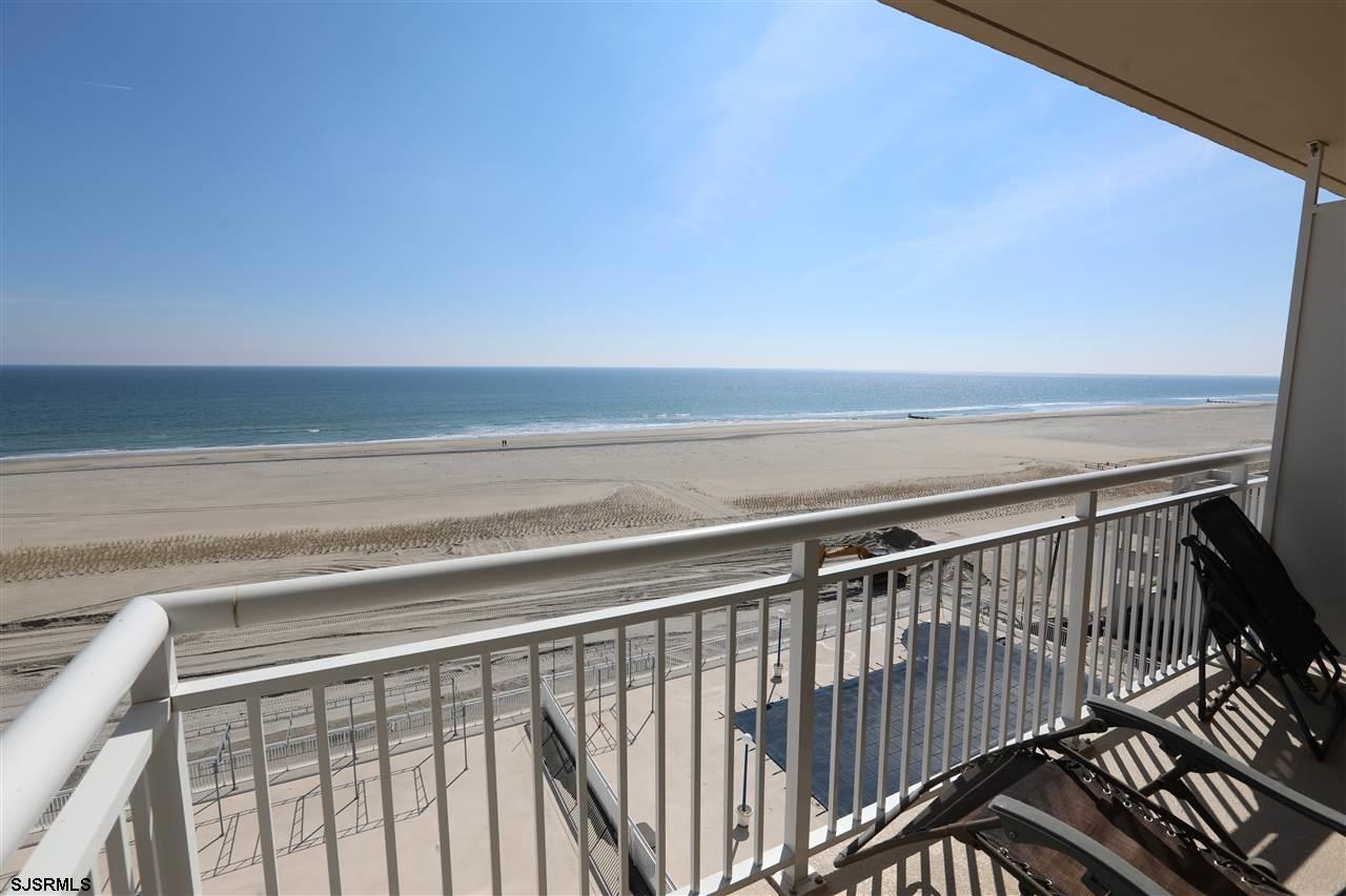 9400 Atlantic Avenue, Unit 709 Margate City, NJ 08402 - Photo 9 of 11 a view of deck with wooden floor and fence