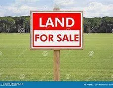 a sign that is on a brick wall