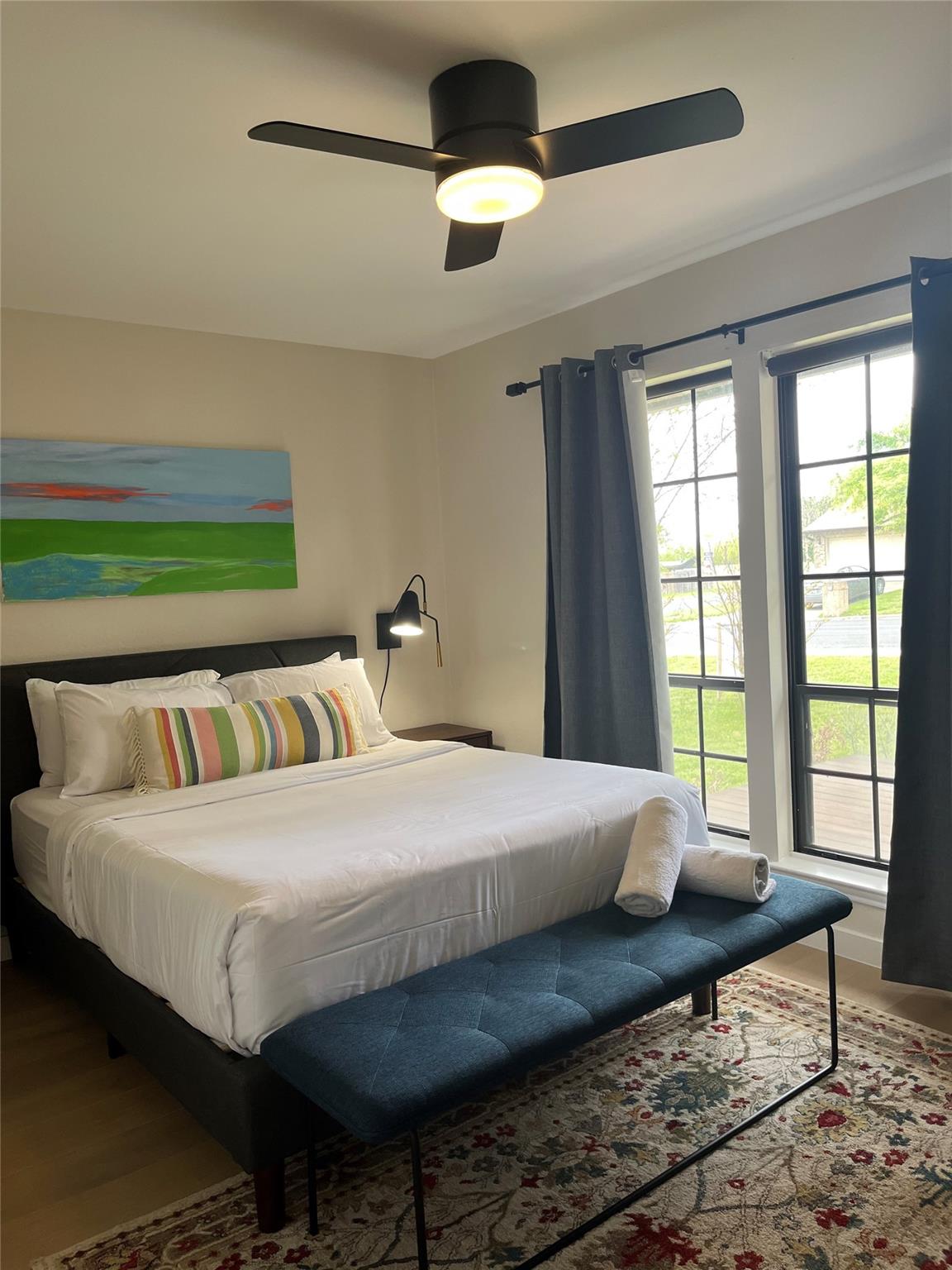 8418 Seminary Ridge Drive Austin, TX 78745 - Photo 13 of 19 a bedroom with a bed and a large window