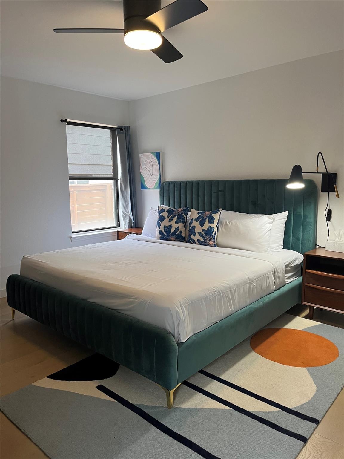 8418 Seminary Ridge Drive Austin, TX 78745 - Photo 14 of 19 a bedroom with a bed and window