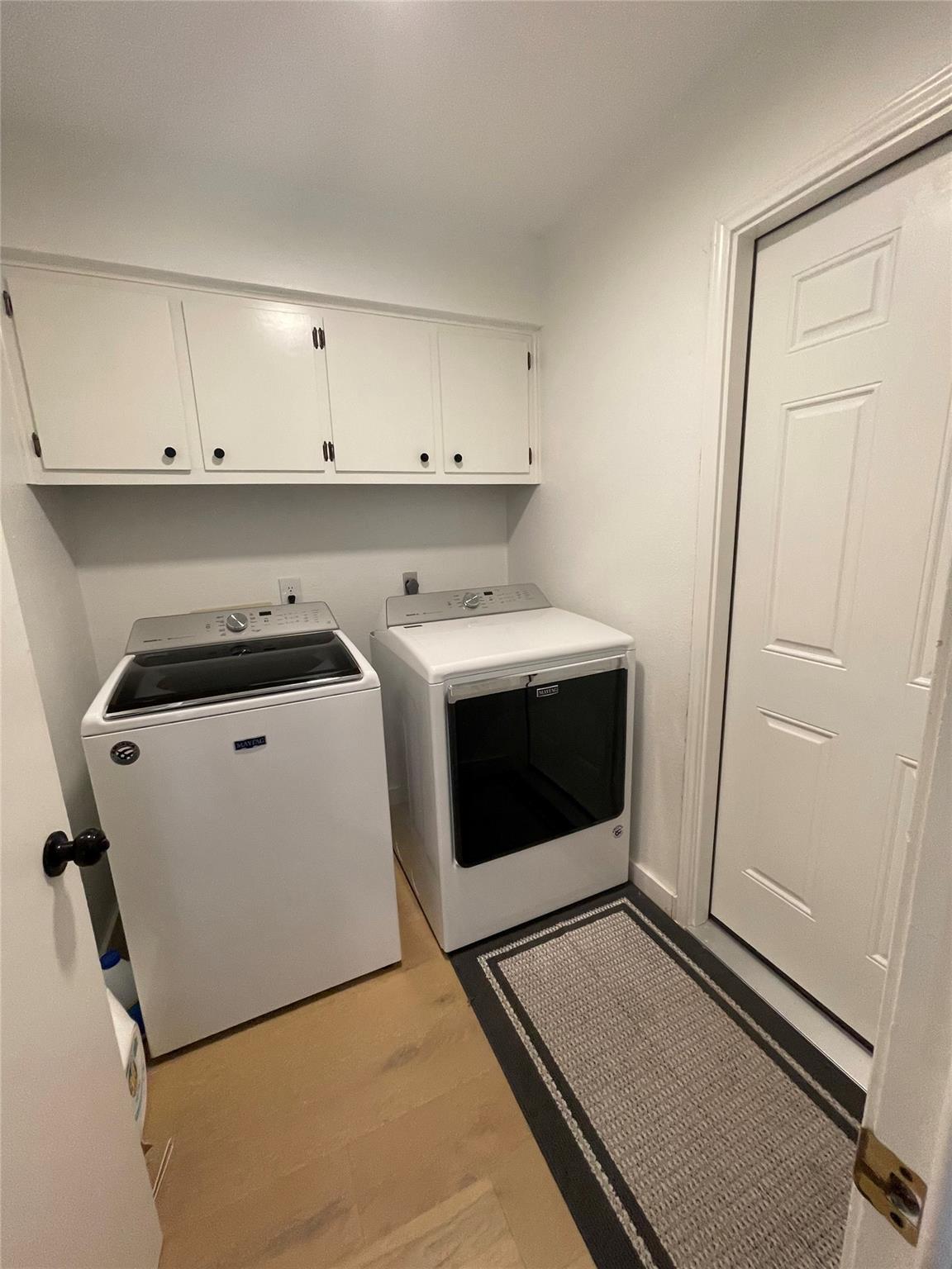 8418 Seminary Ridge Drive Austin, TX 78745 - Photo 15 of 19 a utility room with dryer and washer