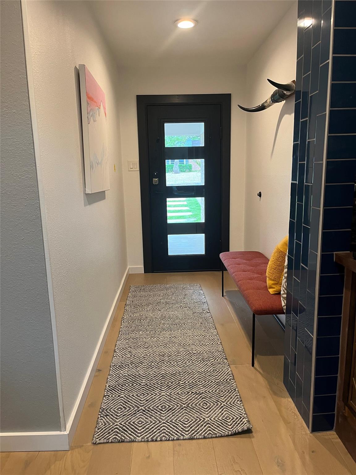 8418 Seminary Ridge Drive Austin, TX 78745 - Photo 4 of 19 a living room with furniture and a rug