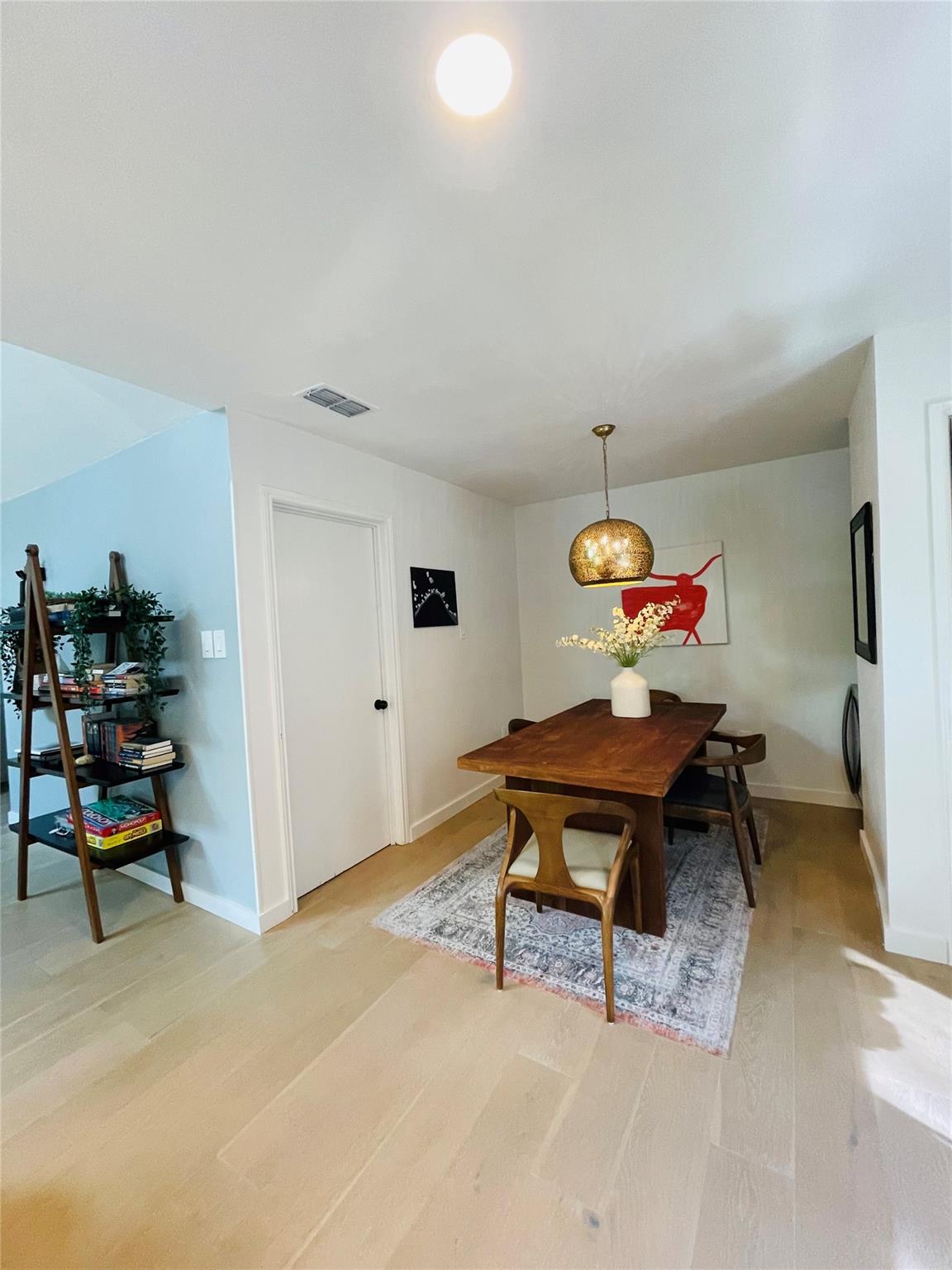 8418 Seminary Ridge Drive Austin, TX 78745 - Photo 10 of 19 a living room with furniture and a rug