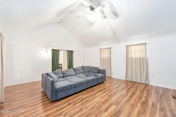 a kitchen with a refrigerator stove and sink