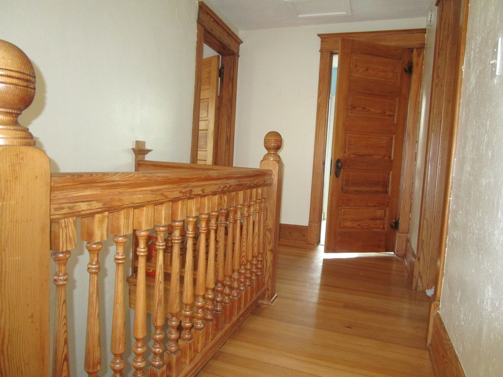 119 West Chestnut Street Compton, IL 61318 - Photo 12 of 27 a bedroom with furniture and wooden floor