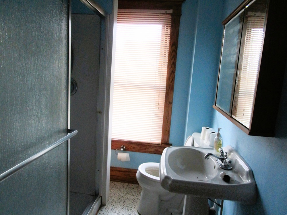 119 West Chestnut Street Compton, IL 61318 - Photo 18 of 27 a bathroom with a sink and a mirror