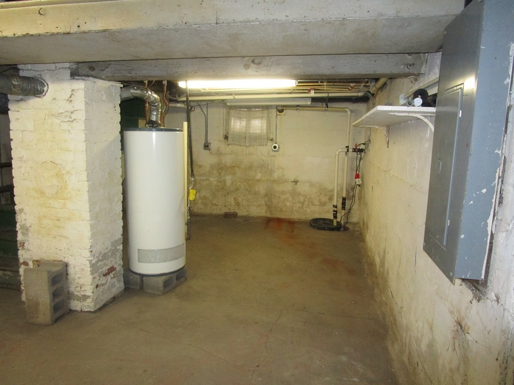 119 West Chestnut Street Compton, IL 61318 - Photo 21 of 27 a view of a storage & utility room with a refrigerator