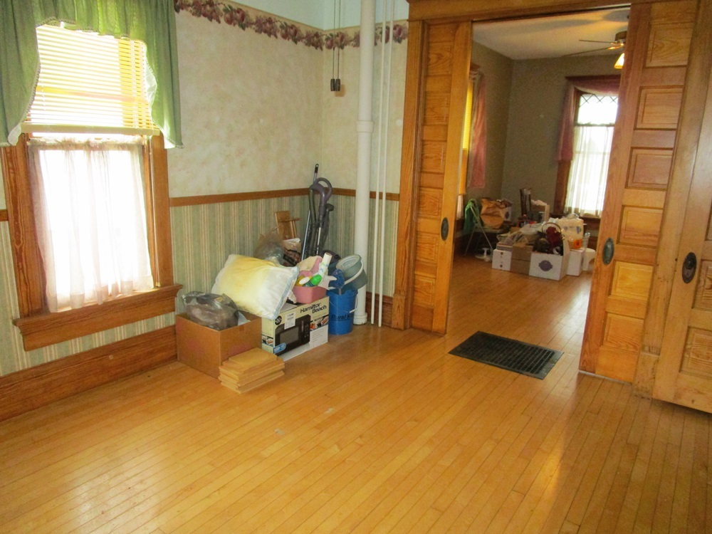 119 West Chestnut Street Compton, IL 61318 - Photo 6 of 27 a bedroom with a bed and a window