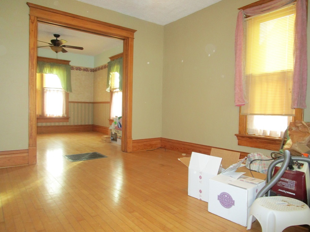 119 West Chestnut Street Compton, IL 61318 - Photo 7 of 27 a view of a livingroom with wooden floor and a window