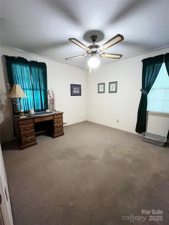 a bathroom with a sink toilet and mirror