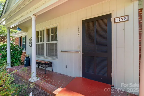 a backyard of a house with seating space