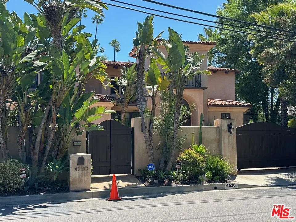front view of a house with a street