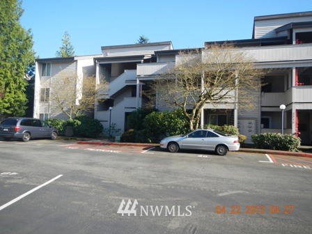 2517 Northeast 4th Street, Unit 524 Renton, WA 98056 - Photo 1 of 10 a view of a car parked in front of a building