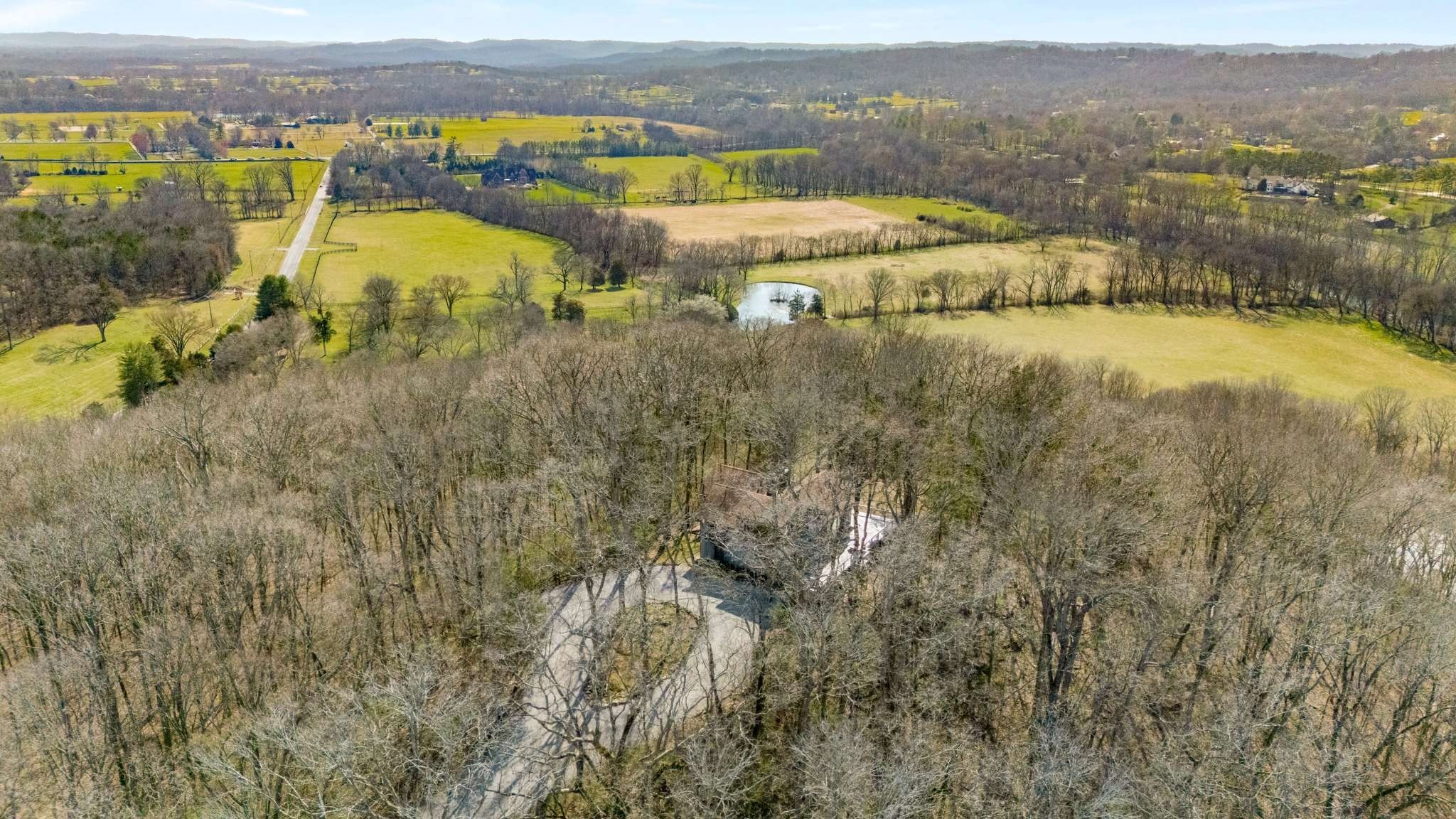 360 Vaughn Road Nashville, TN 37221 - Photo 32 of 36 an aerial view of residential houses with outdoor space and river