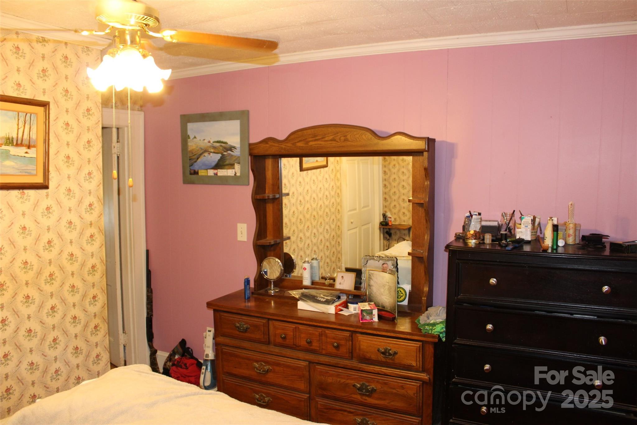 68 Rector Street Tryon, NC 28782 - Photo 15 of 29 a room with a dresser and a mirror