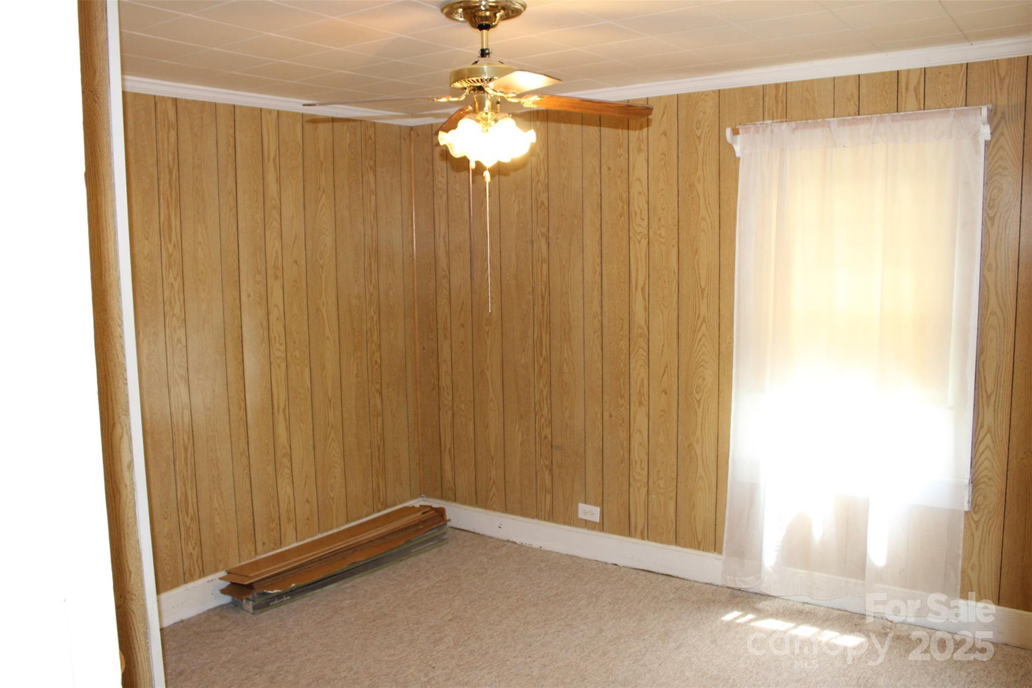 68 Rector Street Tryon, NC 28782 - Photo 20 of 29 a view of a chandelier in a room