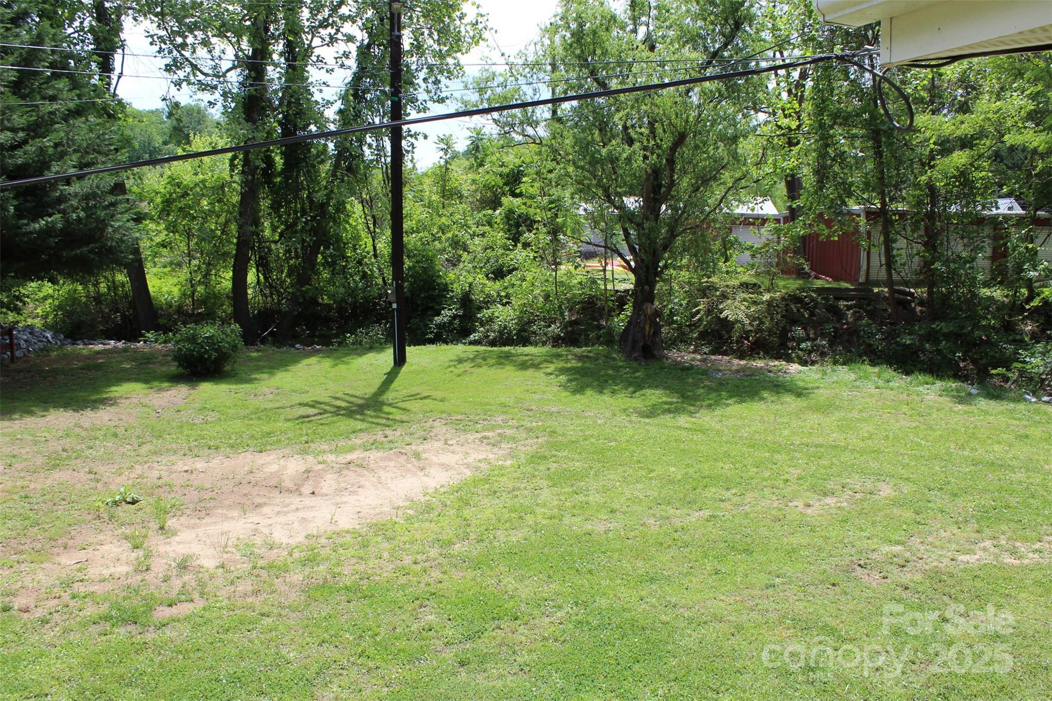 68 Rector Street Tryon, NC 28782 - Photo 27 of 29 a view of a backyard