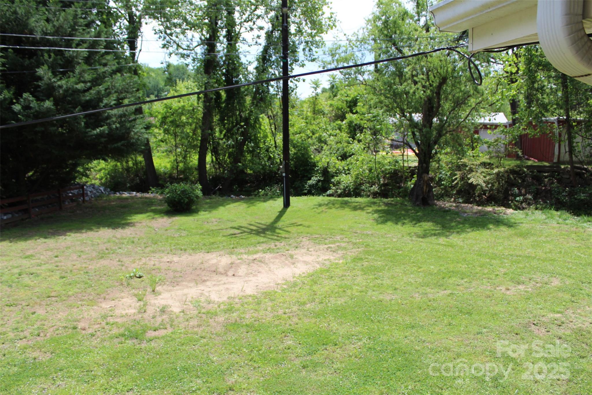 68 Rector Street Tryon, NC 28782 - Photo 28 of 29 a view of a yard with a tree