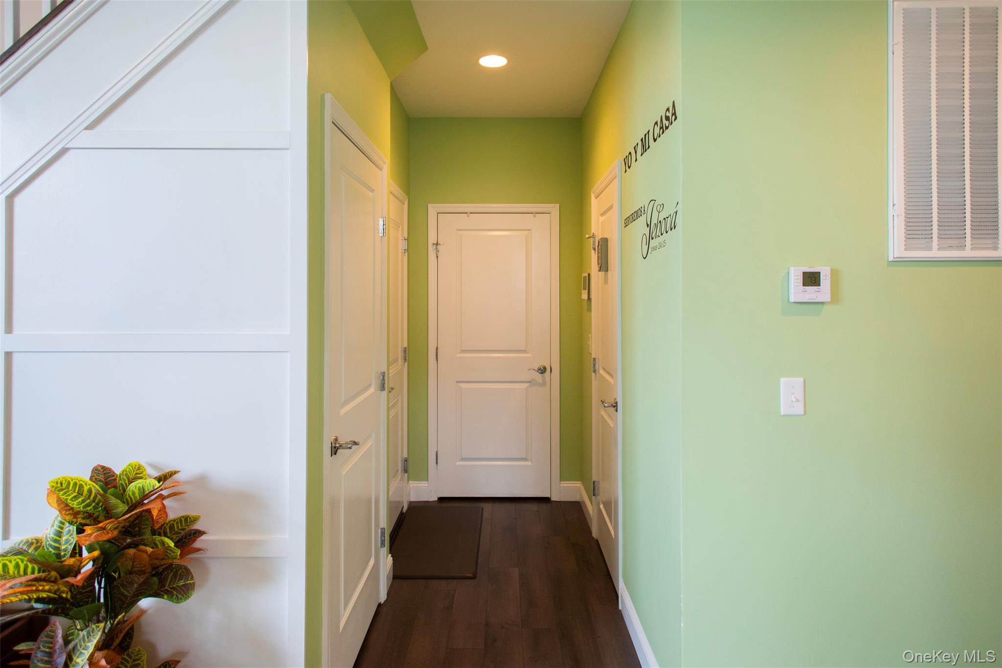 29 Wild Flower Drive Ridge, NY 11961 - Photo 14 of 45 a view of a hallway with a flower pot