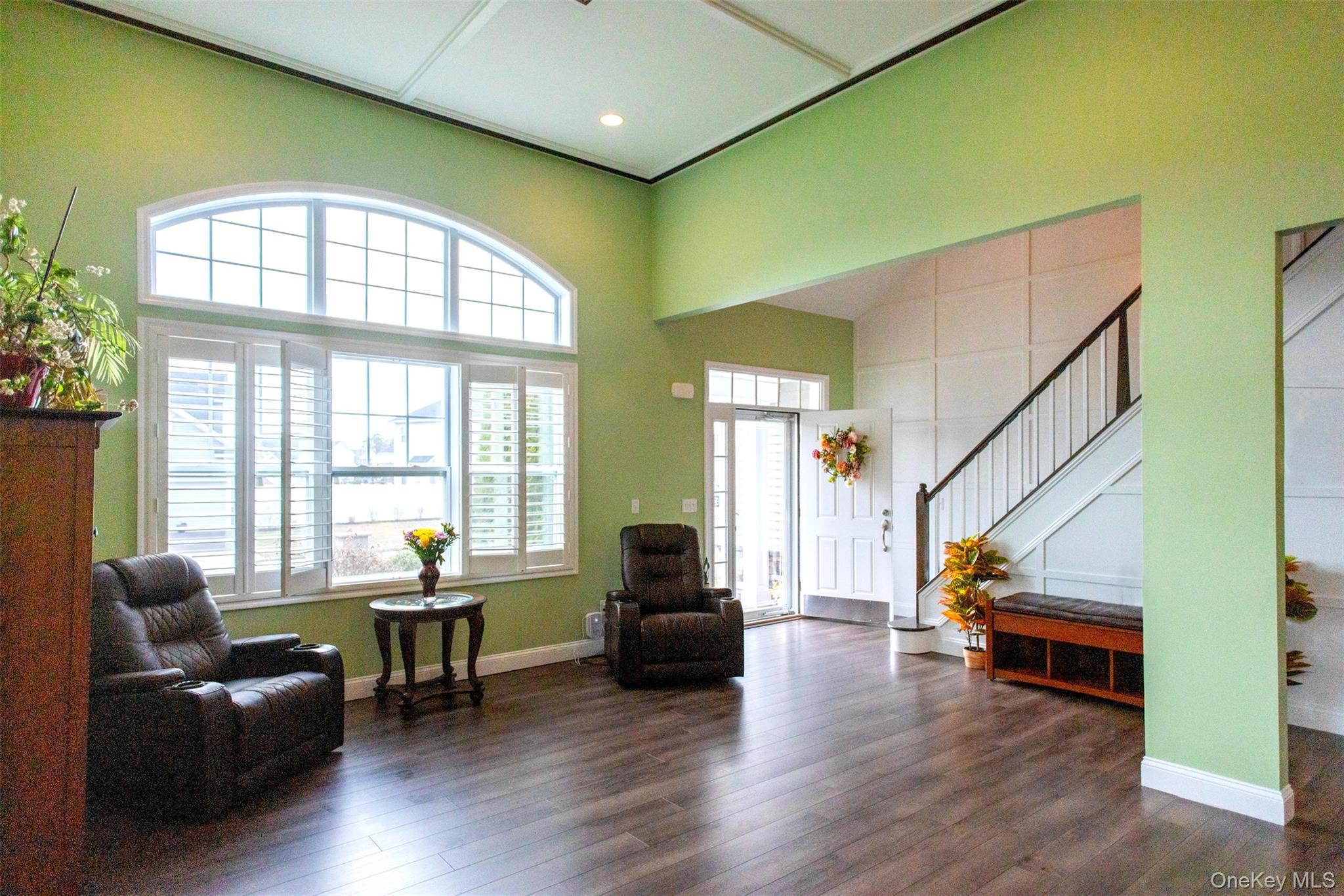 29 Wild Flower Drive Ridge, NY 11961 - Photo 15 of 45 a living room with furniture and a large window