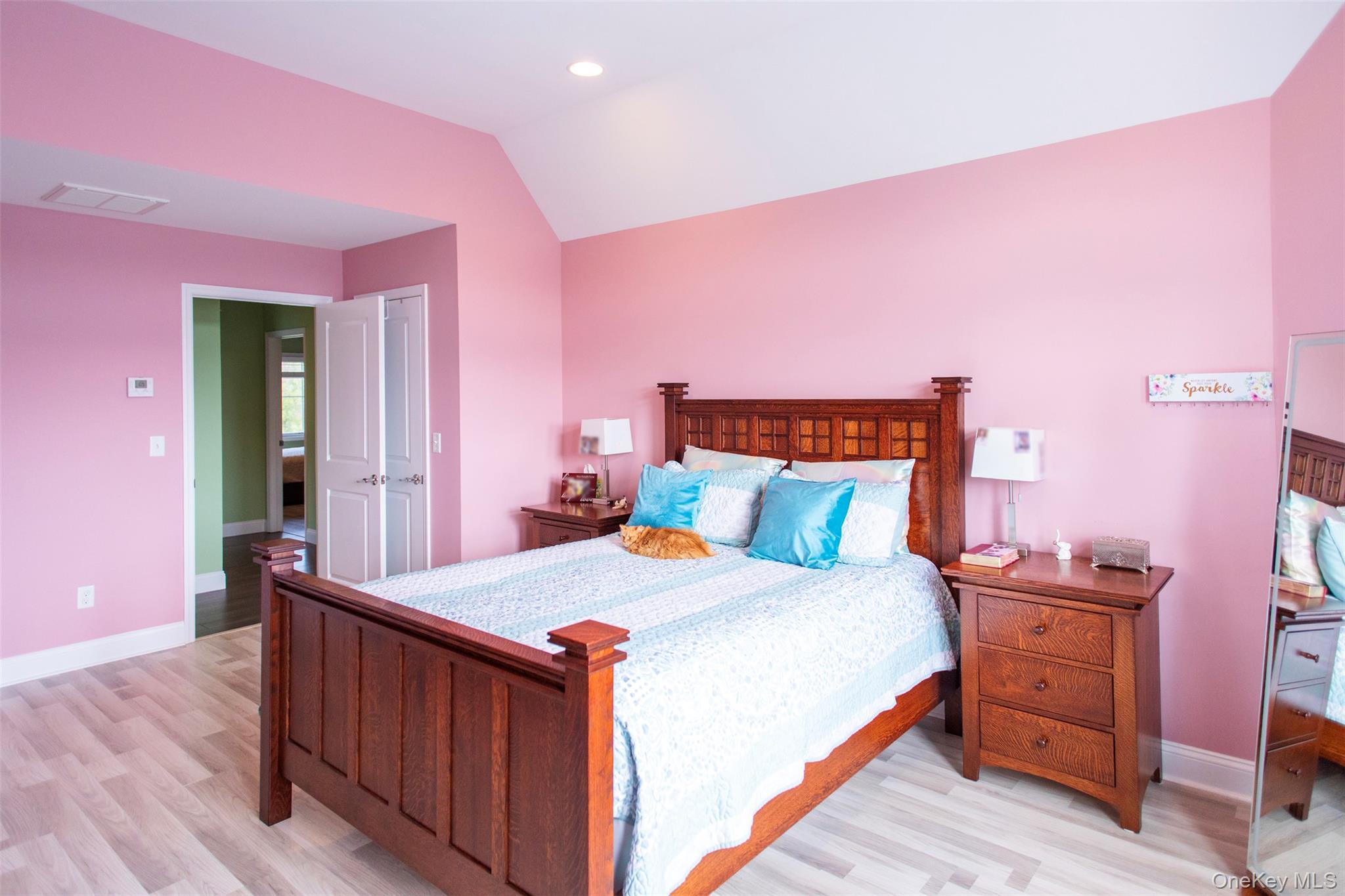29 Wild Flower Drive Ridge, NY 11961 - Photo 21 of 45 a bedroom with a bed and a dresser