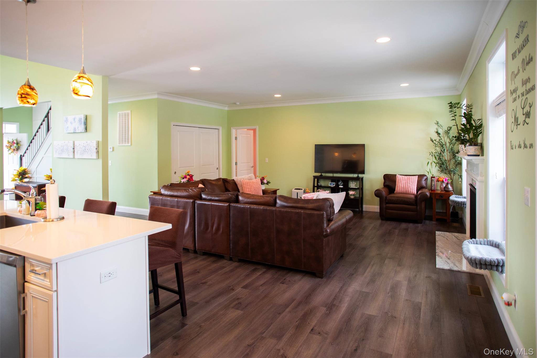 29 Wild Flower Drive Ridge, NY 11961 - Photo 10 of 45 a living room with furniture and a flat screen tv