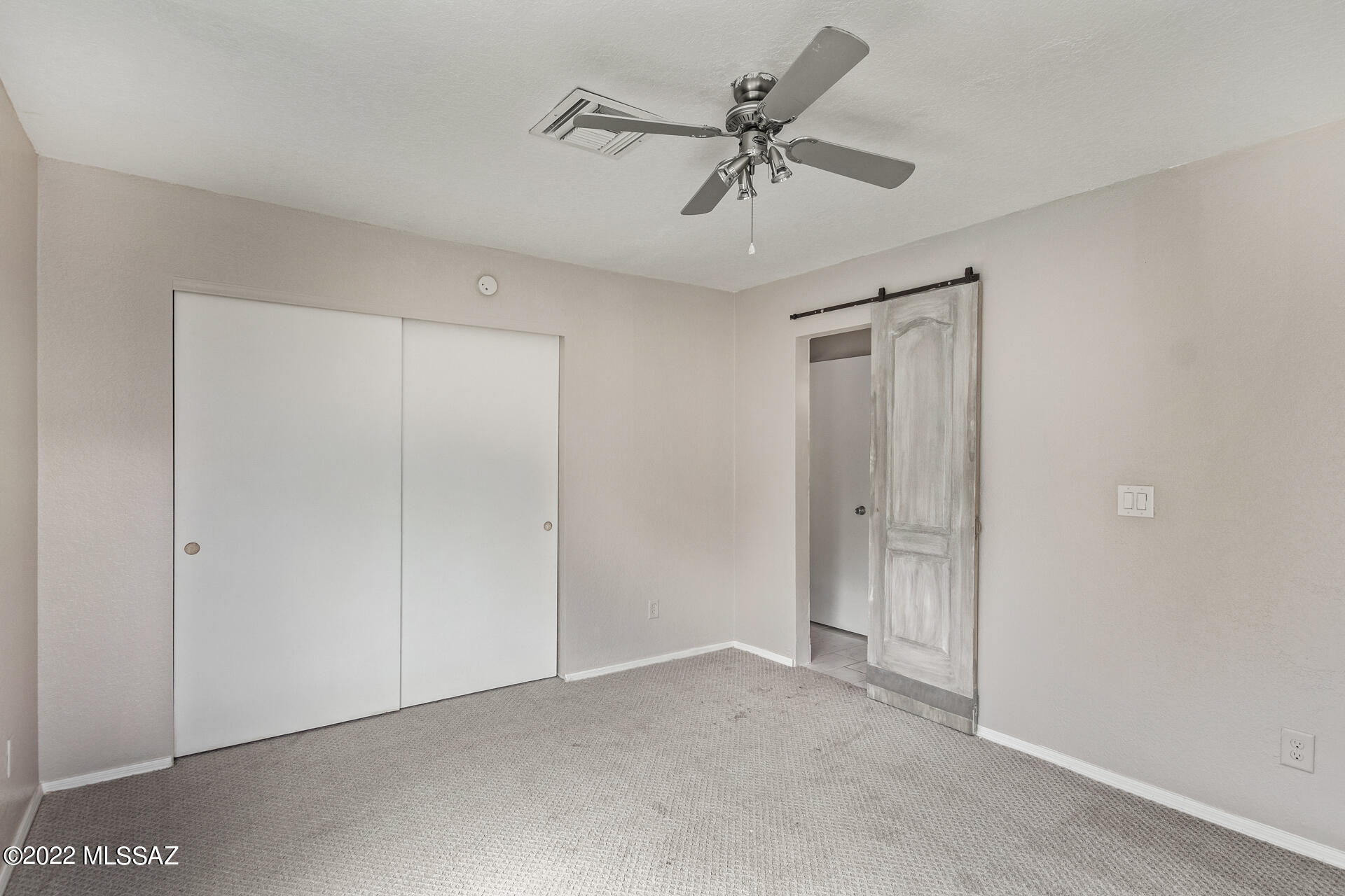 4697 West Weathervane Street Tucson, AZ 85741 - Photo 15 of 25 a view of room with a ceiling fan