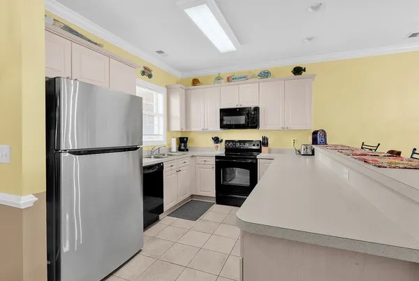 $229,900 | 4823 Magnolia Lake Drive, Unit 302, Myrtle Beach, SC 29577