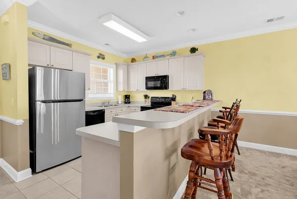 $229,900 | 4823 Magnolia Lake Drive, Unit 302, Myrtle Beach, SC 29577