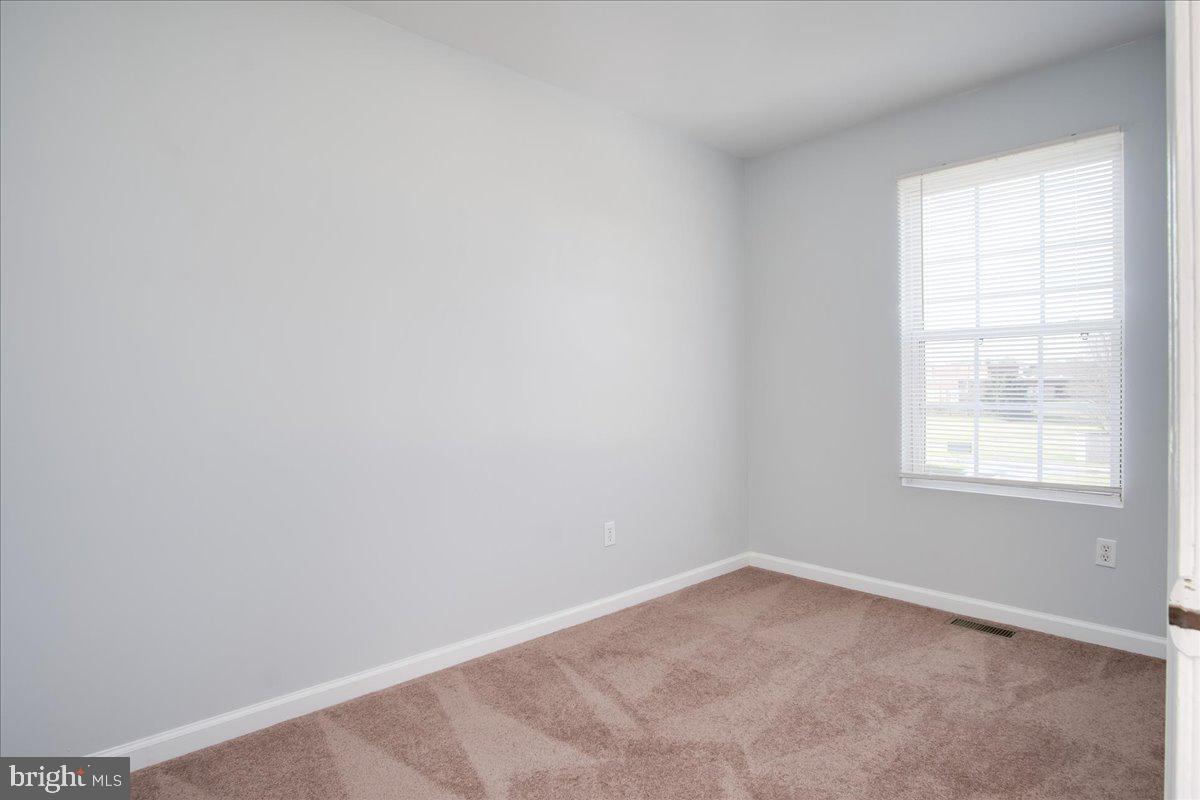 334 East Baltimore Street Taneytown, MD 21787 - Photo 16 of 31 an empty room with a window