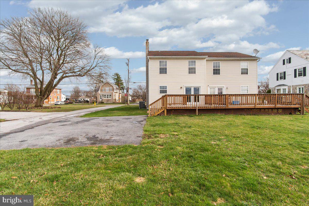 334 East Baltimore Street Taneytown, MD 21787 - Photo 23 of 31 a view of a house with a yard and sitting area