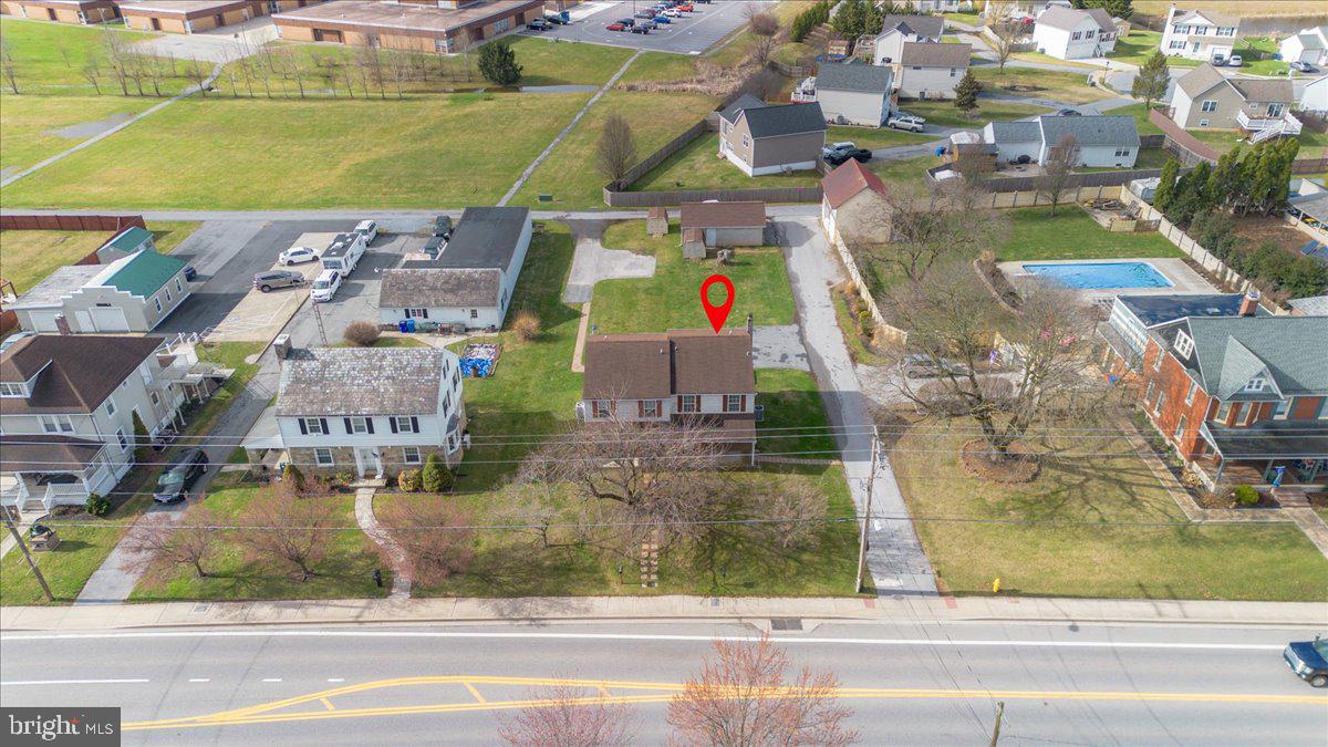 334 East Baltimore Street Taneytown, MD 21787 - Photo 28 of 31 an aerial view of residential houses with outdoor space and parking